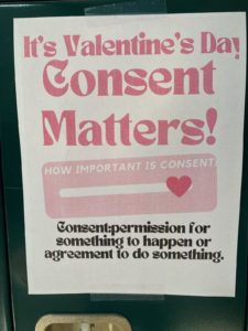 A poster in Rodríguez’s classroom that says, "It's Valentine's Day! Consent matters. Consent: permission for something to happen or agreement to do something."